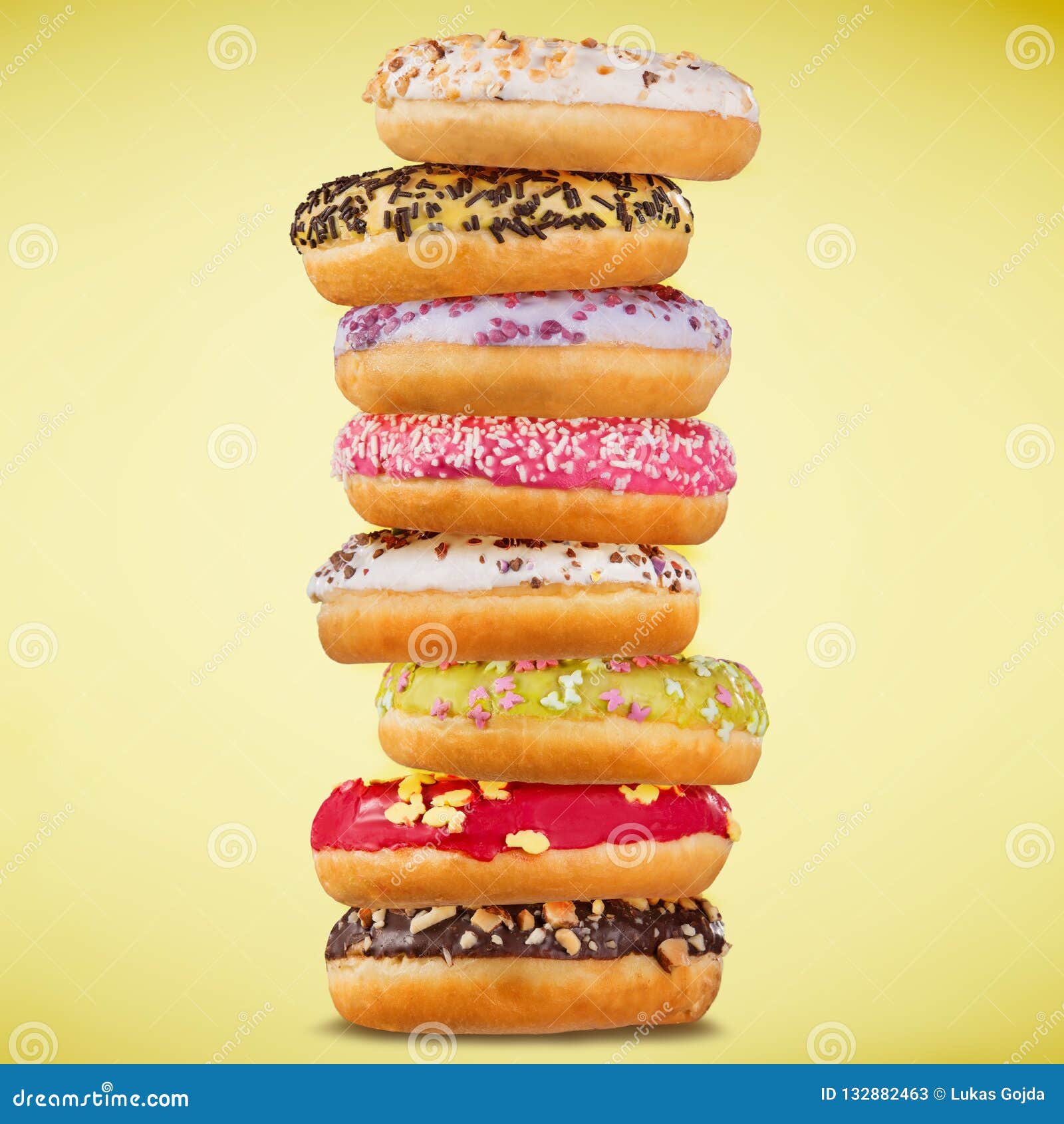 Stack of Assorted Donuts on Pastel Background. Stock Image Image of closeup, collection 132882463