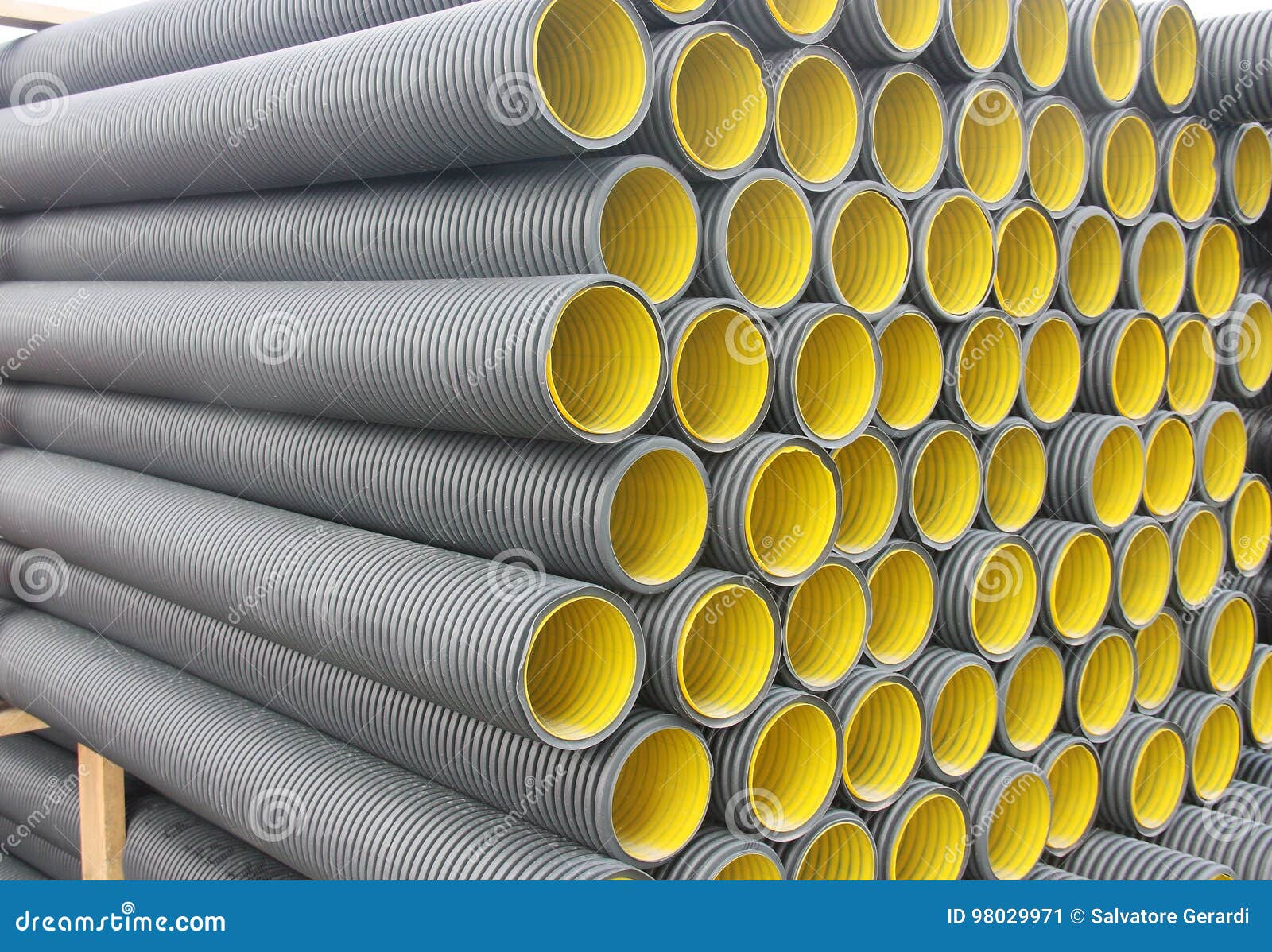 Stack of Black Yellow Corrugated Plastic Pipes Stock Image Image of