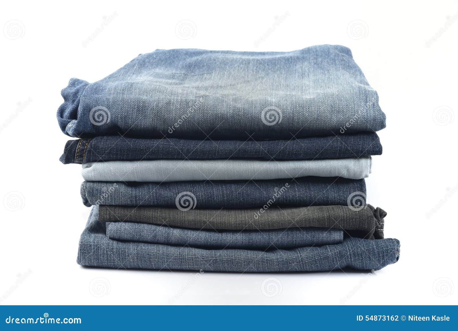 Stack of Blue and Black Jeans on White Background. Stock Photo - Image ...