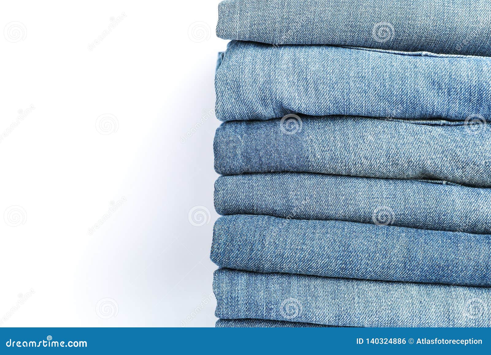 Stack of Blue Jeans on White Background Stock Photo - Image of neatly ...