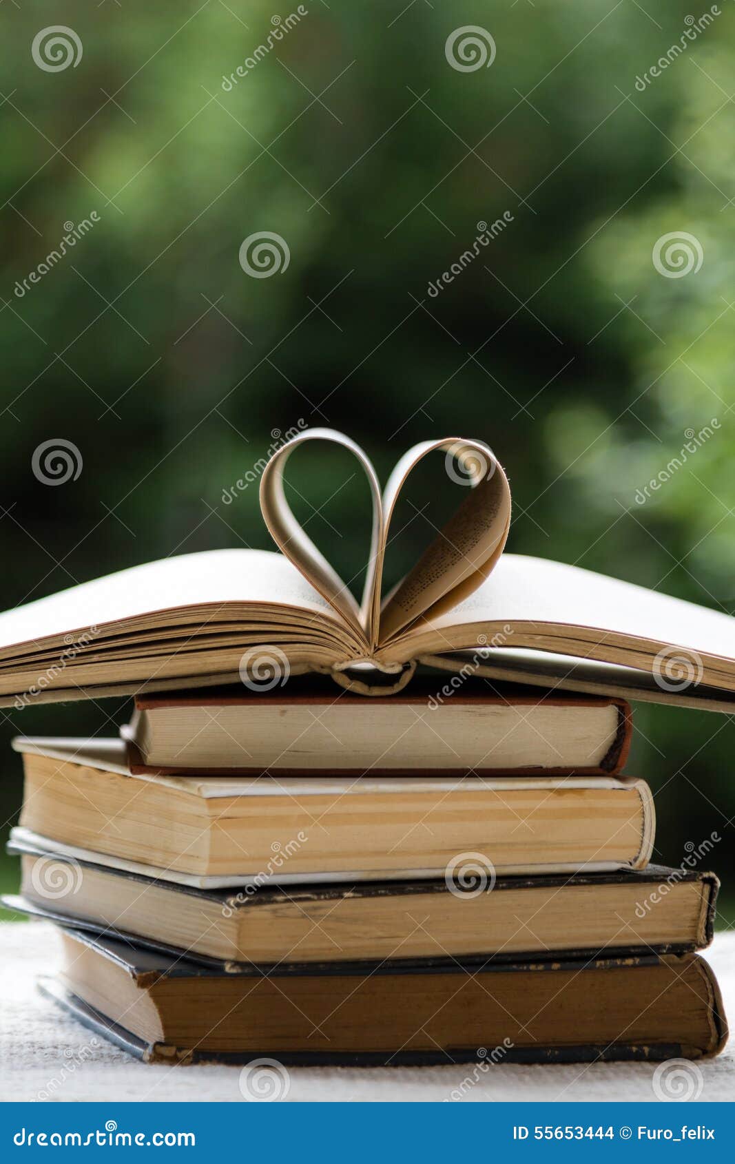 Stack of Books with Heart Shape Stock Photo Image of wisdom, bokeh