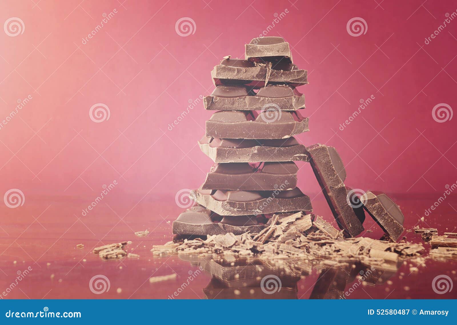 stack of chocolate on reflective glass