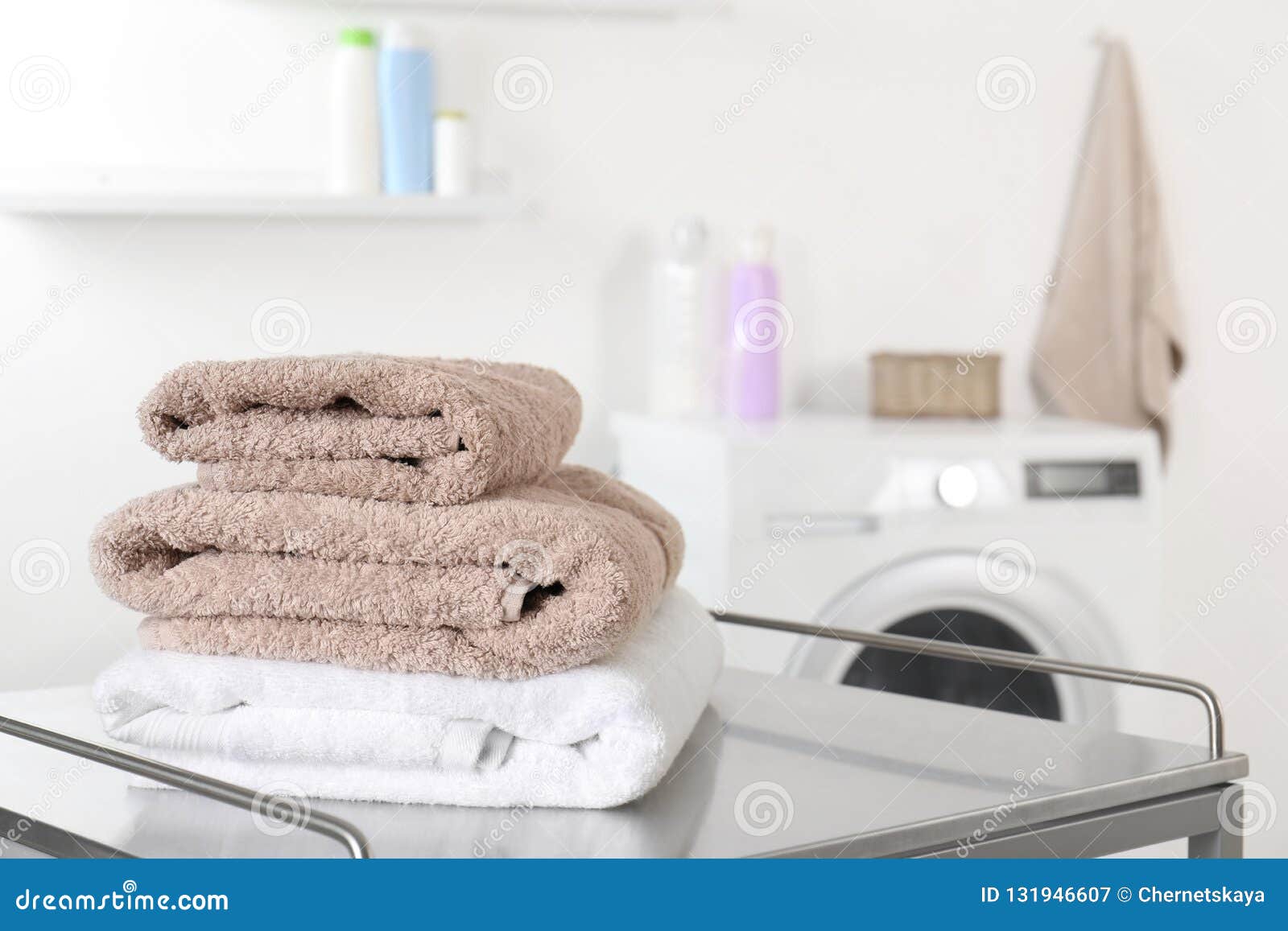 Stack of Clean Soft Towels on Table in Laundry Room Stock Image Image