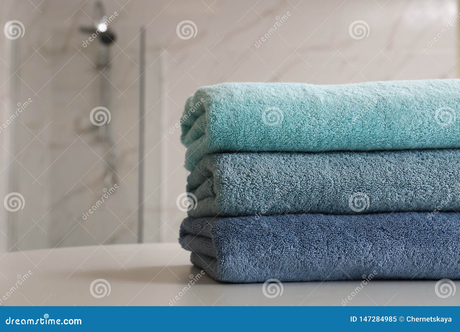 Stack of Clean Towels on Table in Bathroom, Closeup Stock Image Image