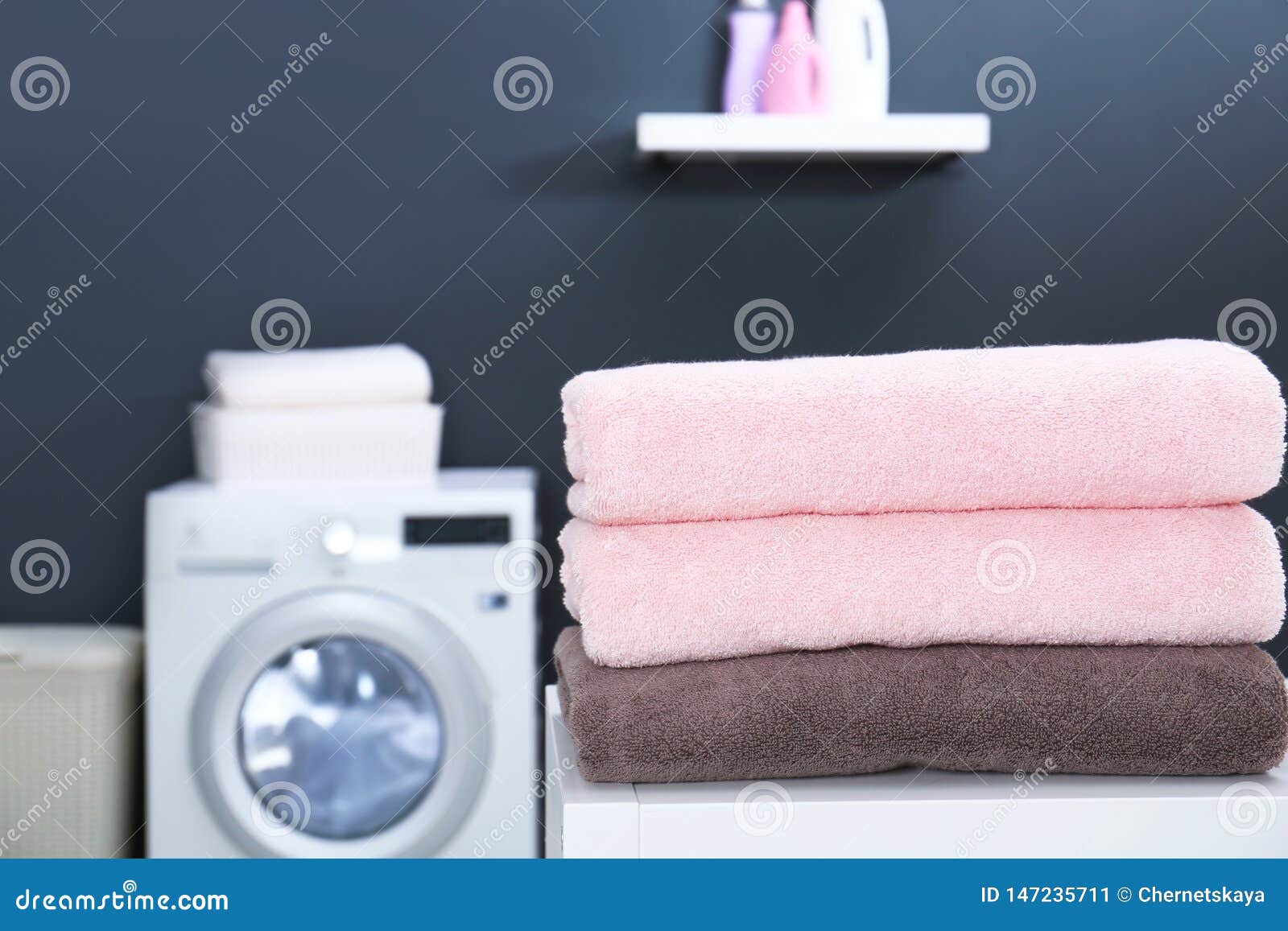 Stack of Clean Towels on Table in Laundry Room Stock Image Image of
