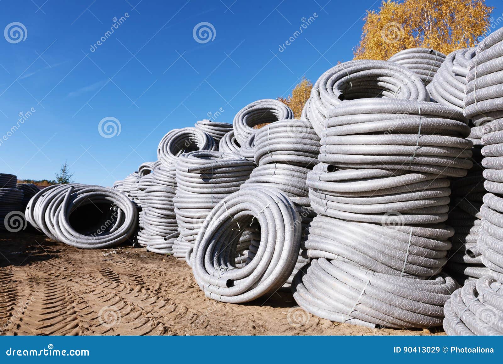 Stack of Coiled Plastic Pvc Polyethylene Corrugated Drainage Pipes for