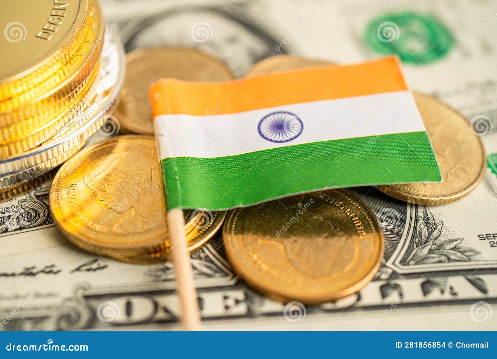 Stack of Coins with India Flag and US Dollar Banknotes Stock Photo