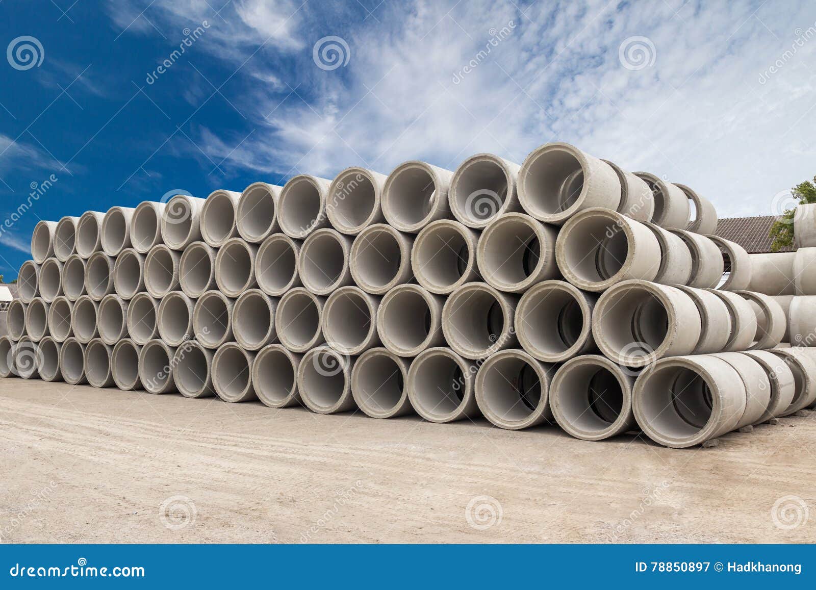 Stack of Concrete Drainage Pipes for Wells and Water Discharges Stock