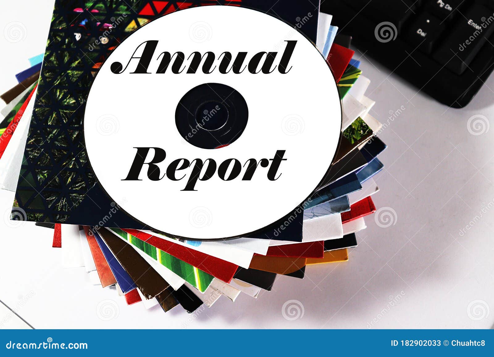 stack of corporate annual report in cdrom format