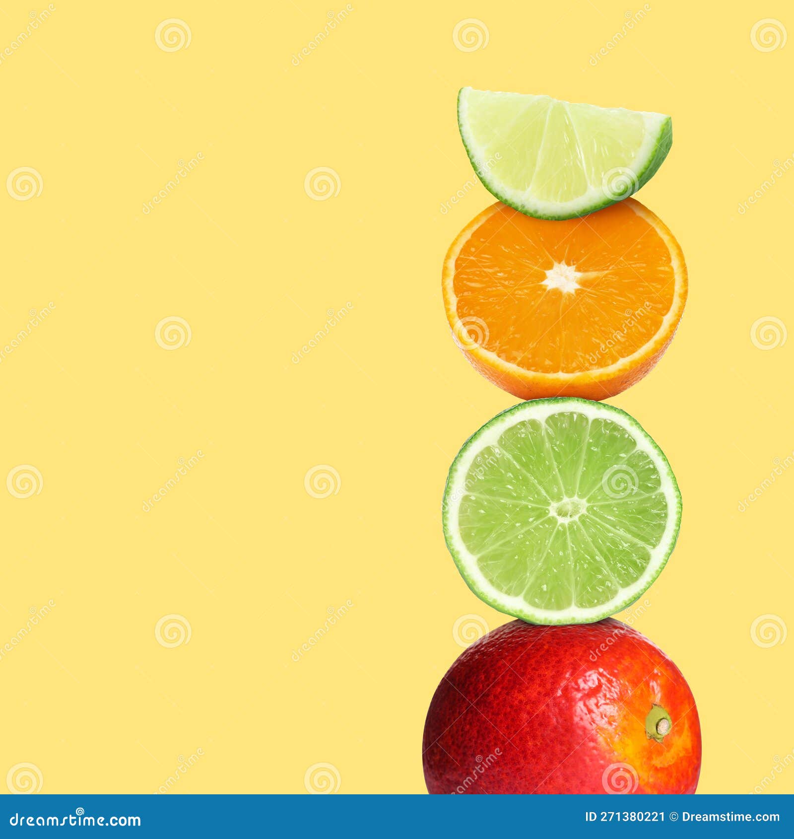 Stack of Different Fresh Citrus Fruits on Light Yellow Background