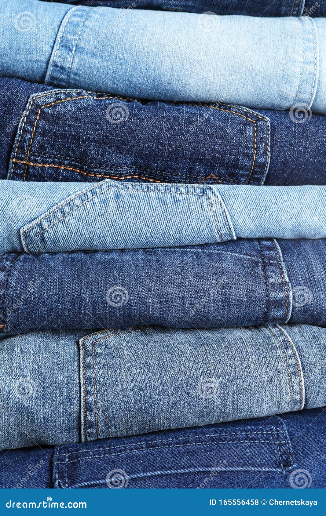 Stack of Different Jeans As Background Stock Photo - Image of garment