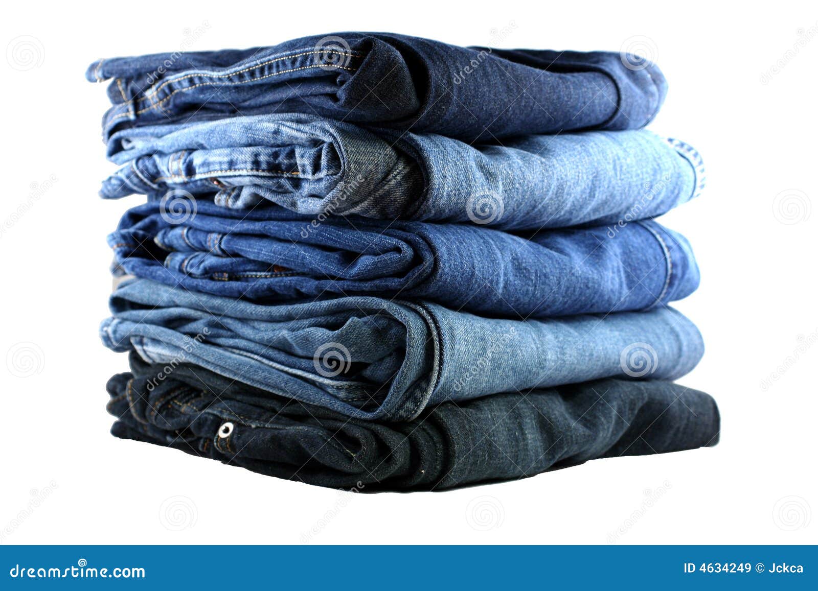 stack of five blue jeans