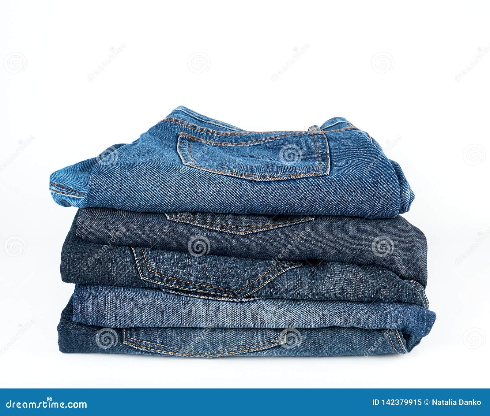 Stack of Folded Blue Jeans on a White Background Stock Image - Image of ...