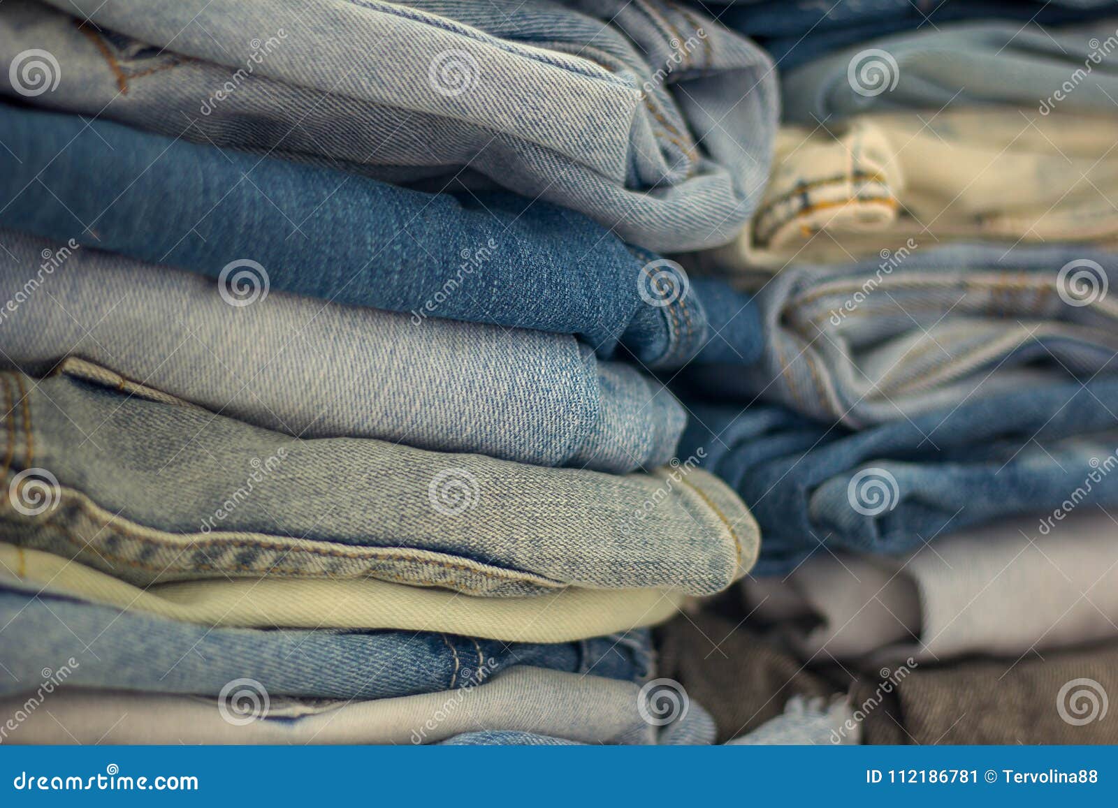 Stack of Folded Jeans of Different Colors and Shades Stock Image ...