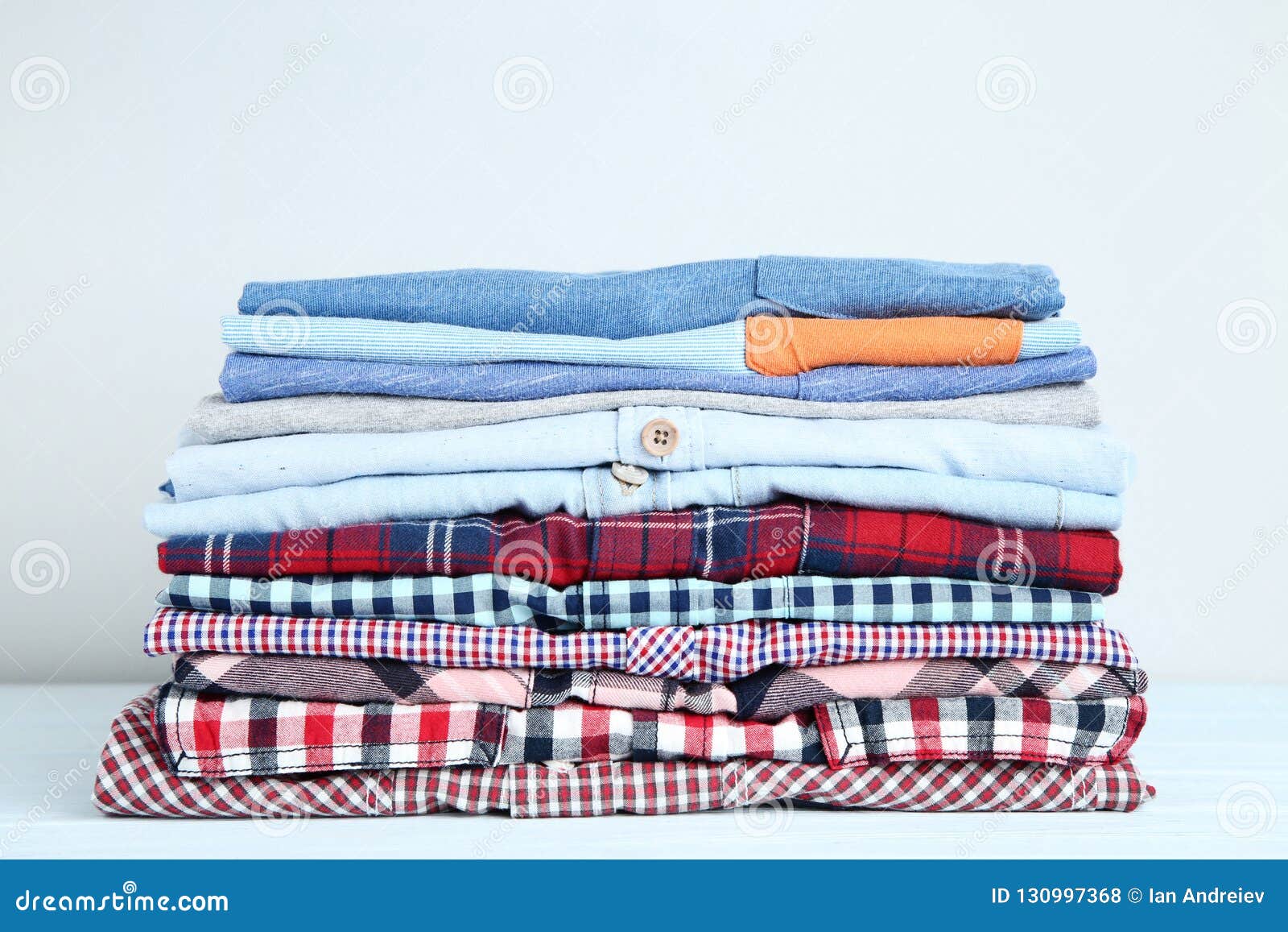 Folded shirts stock photo. Image of fabric, collection - 130997368