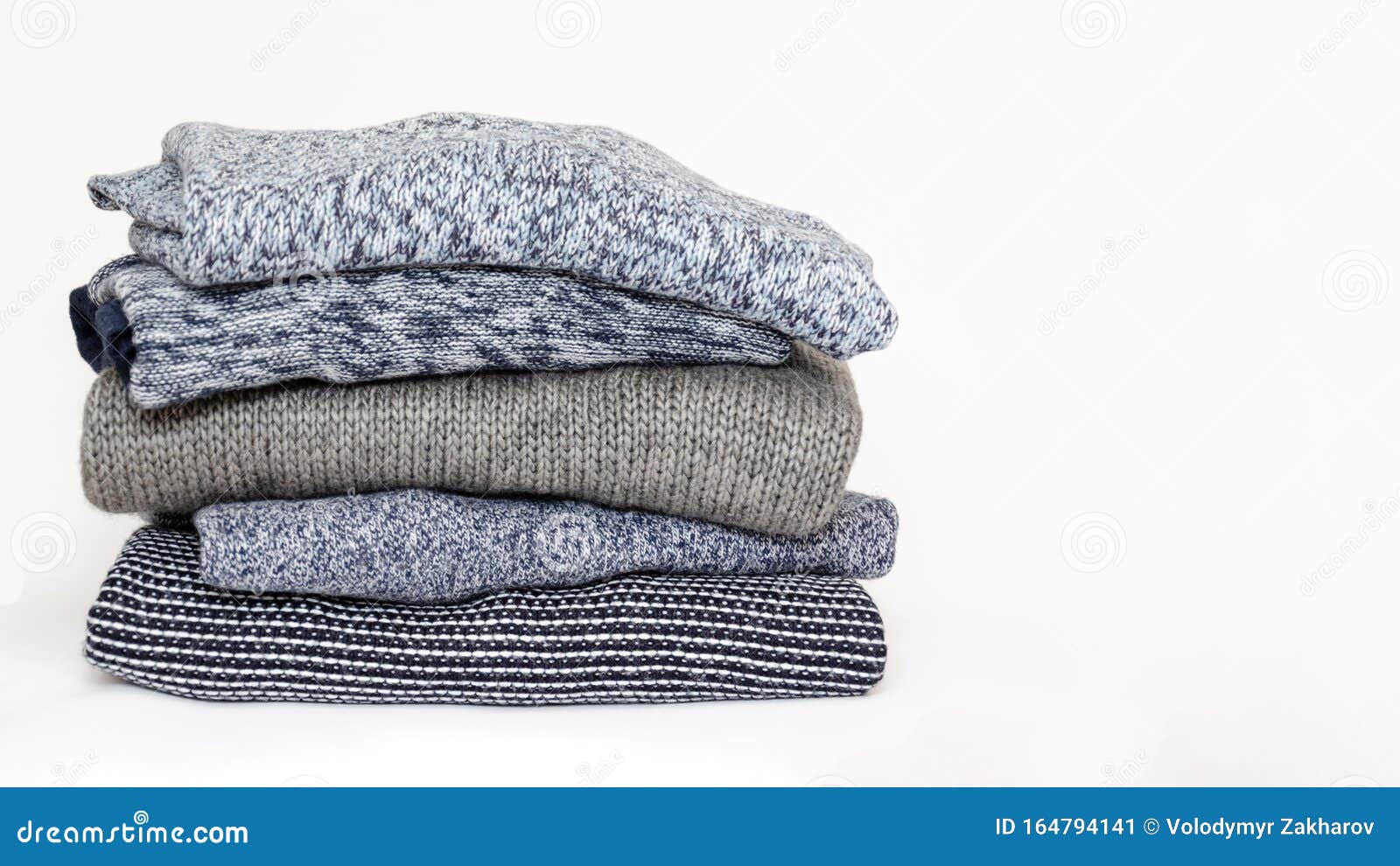 Stack of Folded Woolen Knitwear on White Background. Season of Warm ...