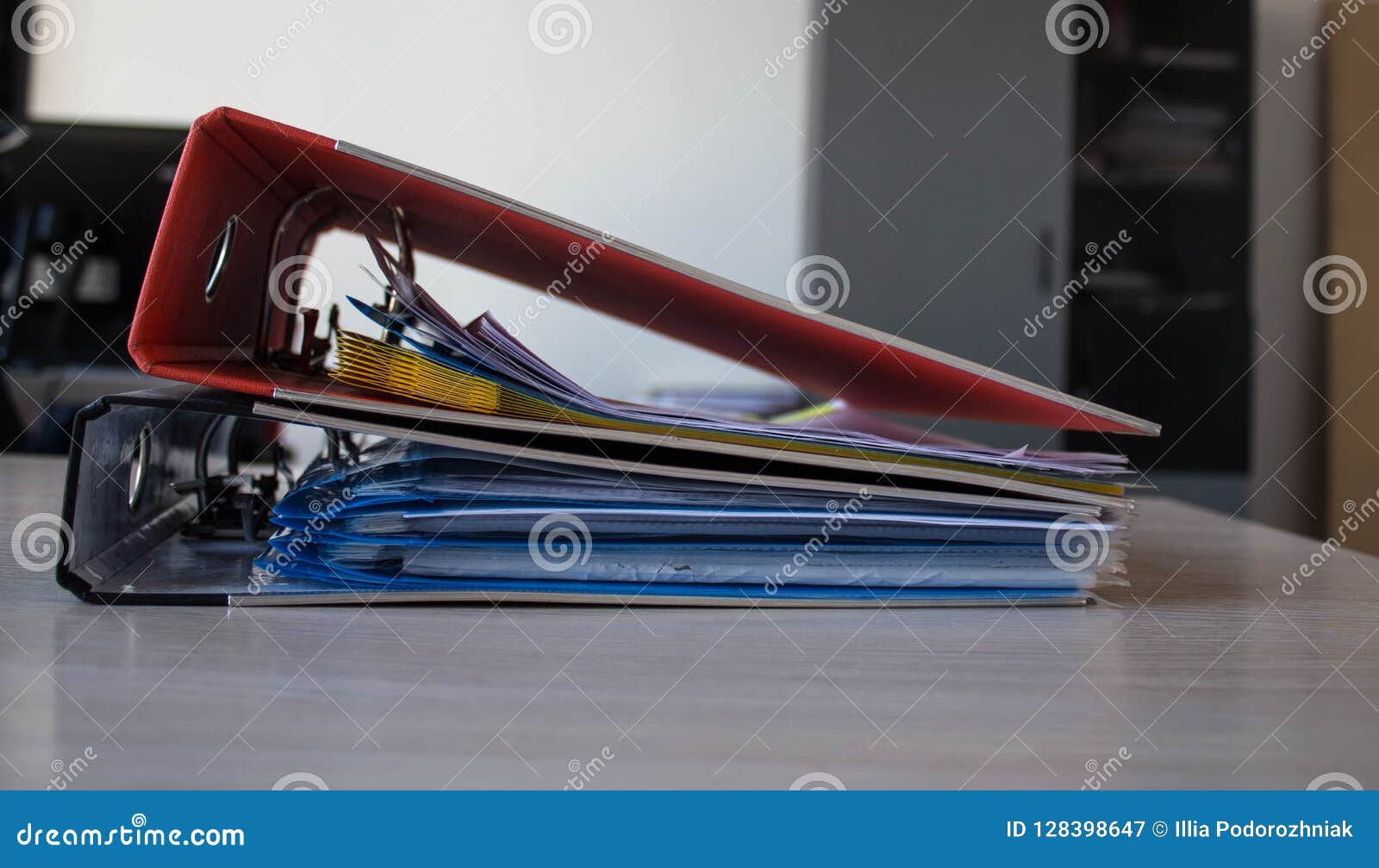 A Stack of Folders with Documents on the Table Stock Image - Image of ...