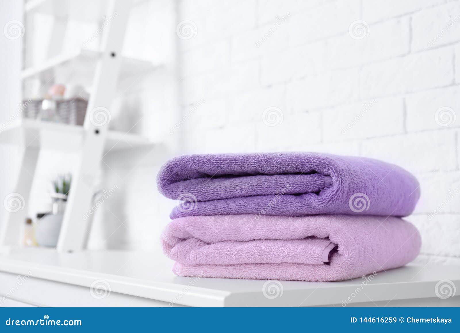 Stack of Fresh Towels on Table in Bathroom. Stock Image Image of