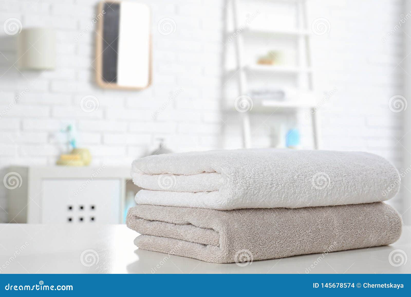 Stack of Fresh Towels on Table in Bathroom Stock Photo Image of