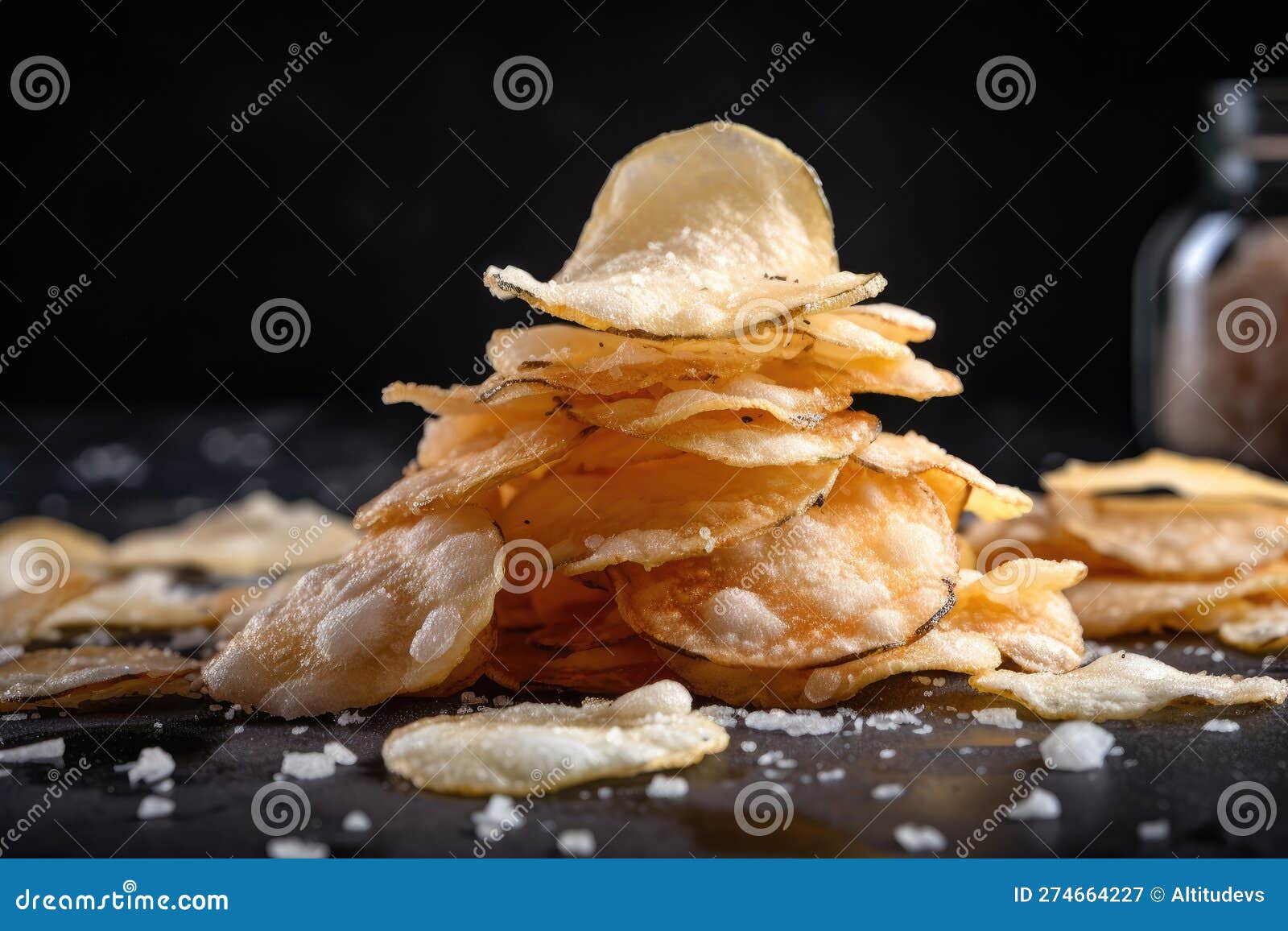 Stack of Freshly Made Potato Chips, with Sprinkle of Salt and Pepper