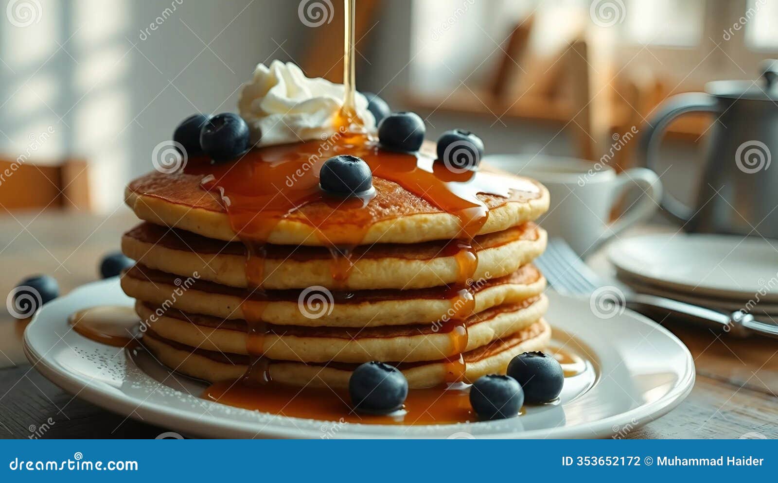 a stack of golden-brown pancakes topped with a drizzle of maple syrup