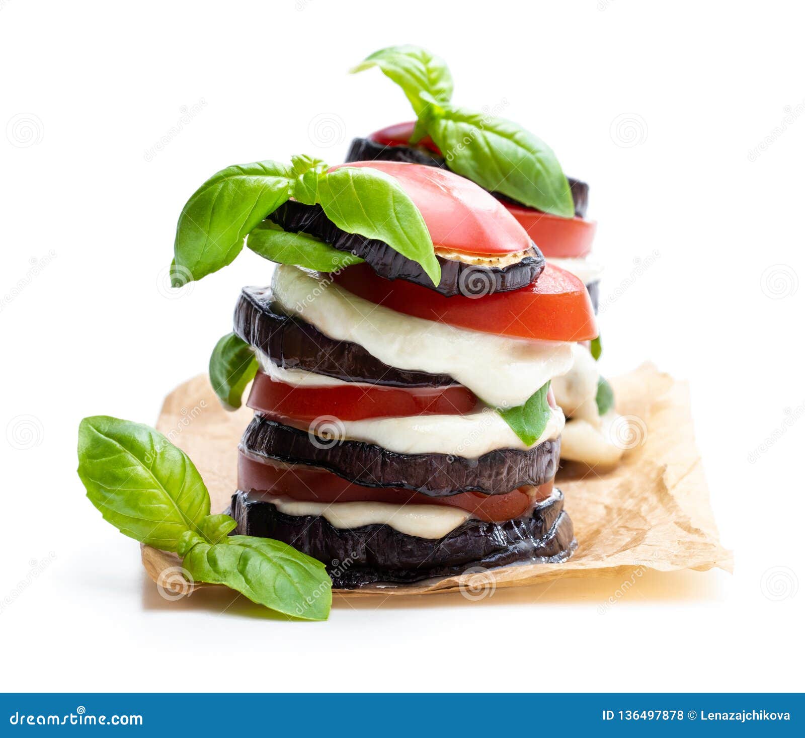 Stack of Grilled Eggplant with Tomato and Mozzarella Isolated on White
