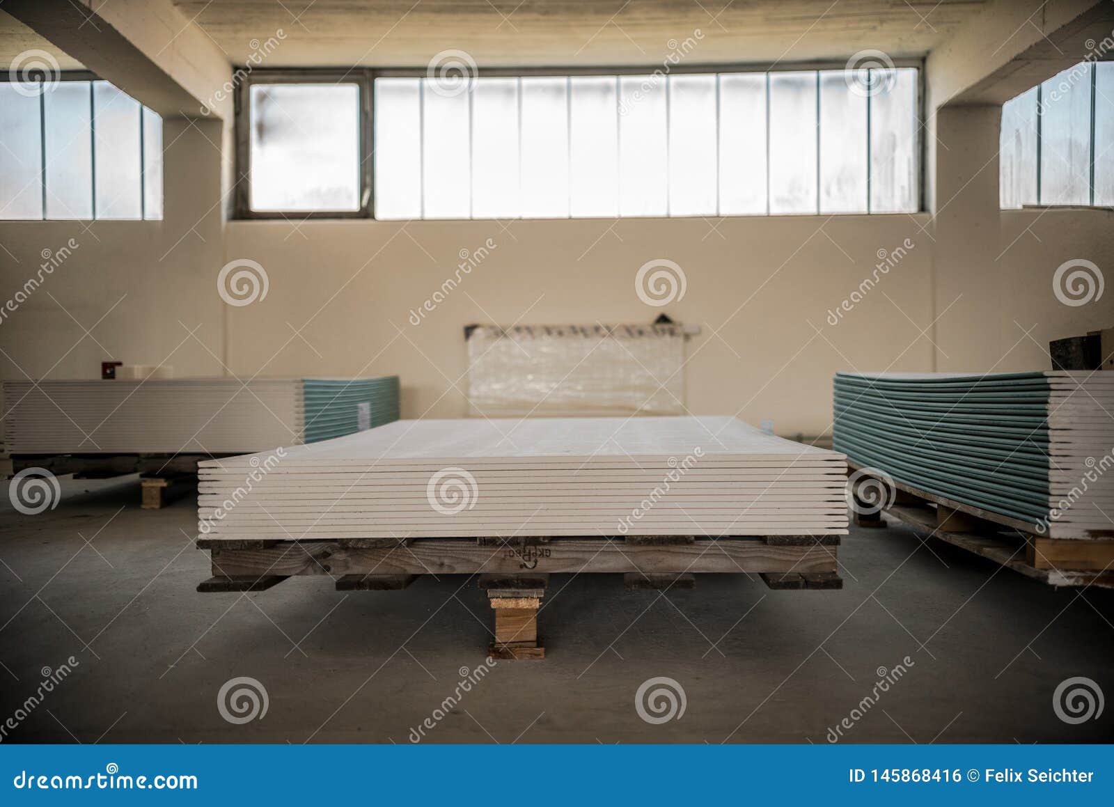 The Stack of Gypsum Board Preparing for Construction Stock Photo