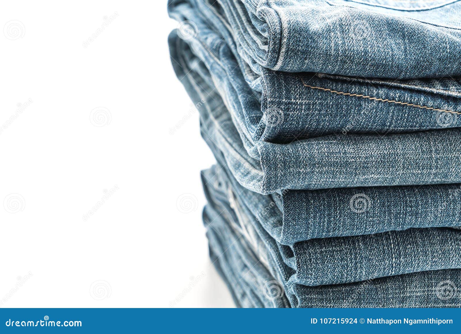 Stack of Jeans Folded on White Background Stock Photo - Image of denim ...