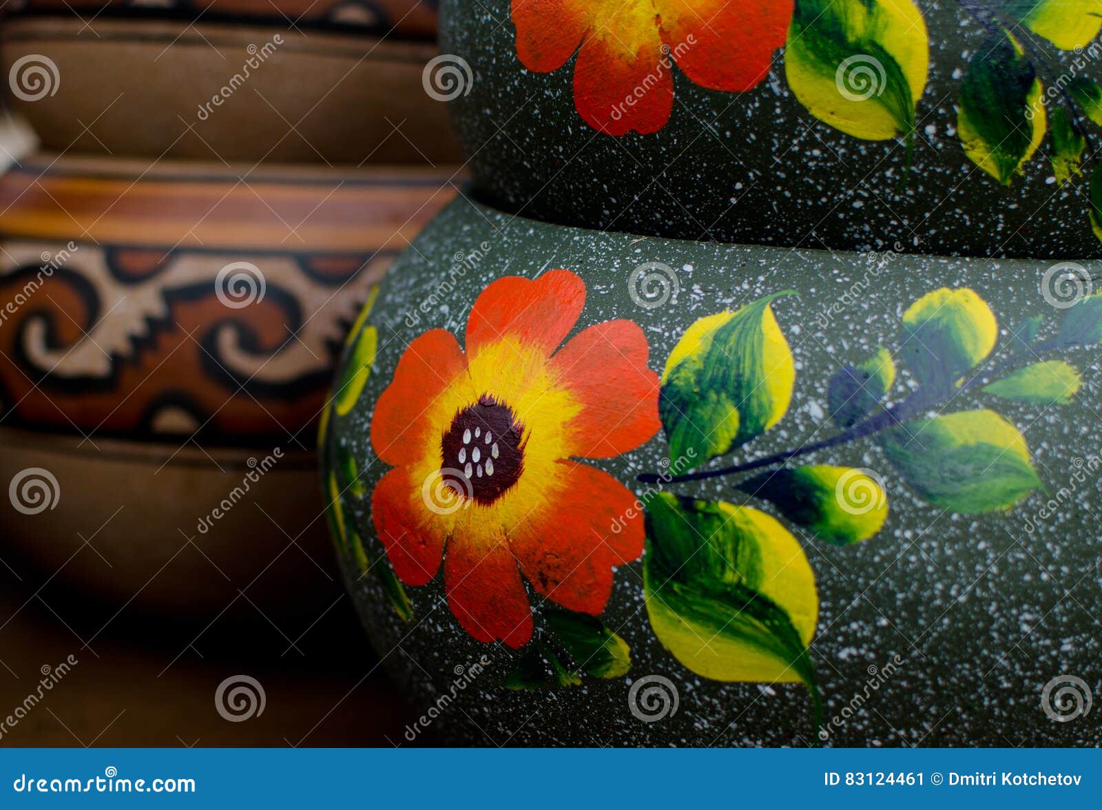 Stack of Mexican Ceramic Pots, Grey Background, Orange Flowers Stock