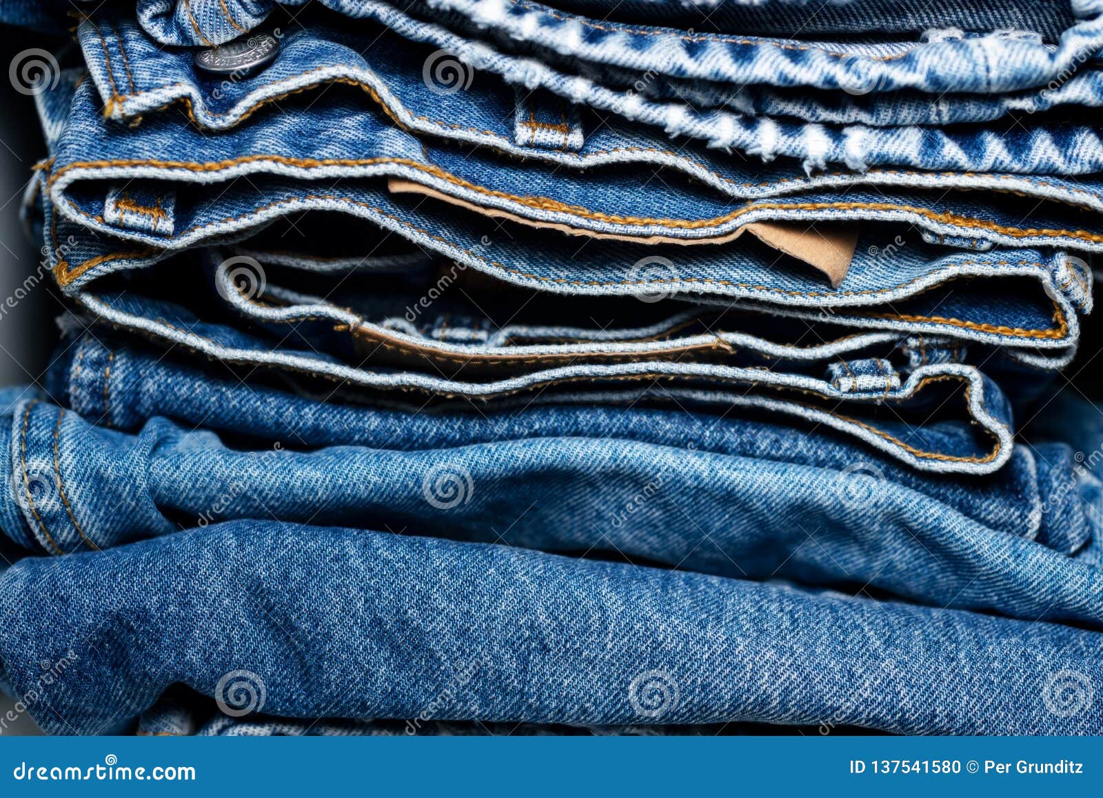 Stack of Mixed Worn Jeans in Wardrobe Stock Photo Image of pants, folded 137541580