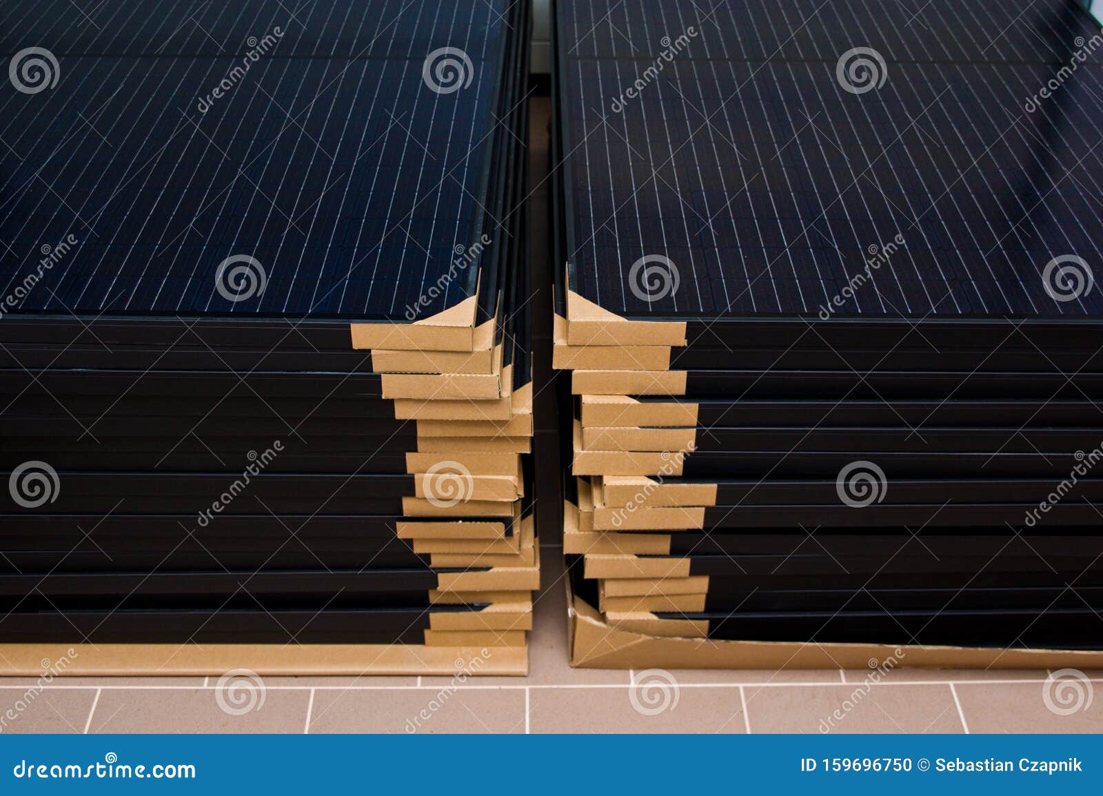 stack of new solar panel ready for installation