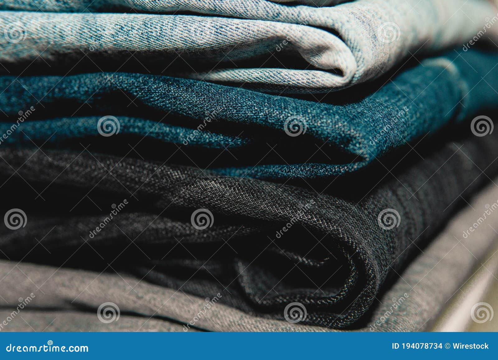 Stack of Neatly Folded Jeans Stock Photo - Image of close, fabric ...