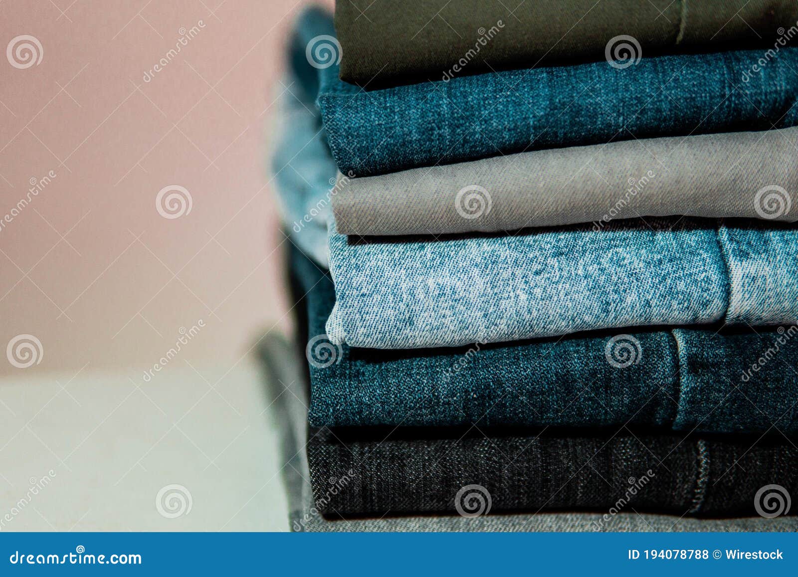 Stack of Neatly Folded Jeans Stock Photo - Image of comfort, woven ...