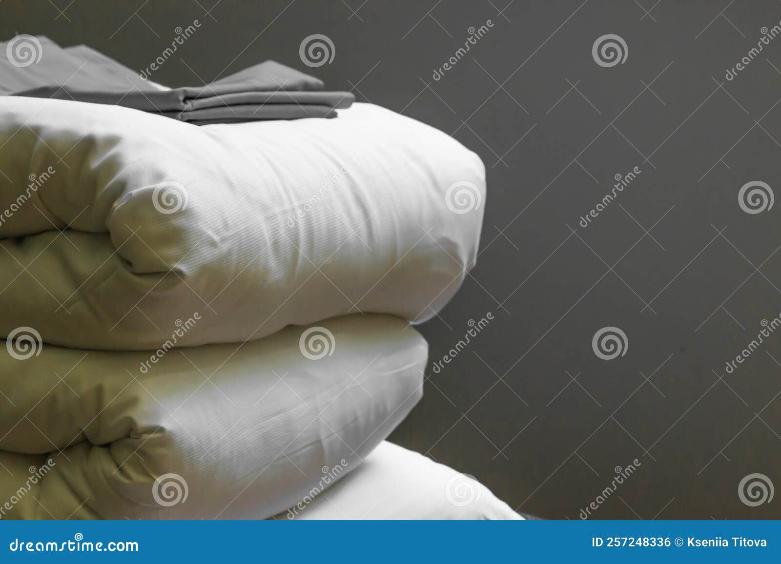 Stack of New Clean Bedding Sheets Soft Folded Blankets and Pillows