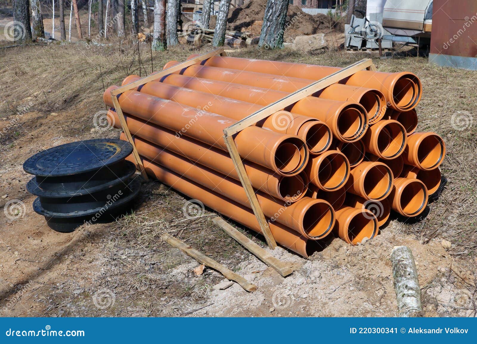 Stack of New Plastic Drainage Pipes at Construction Site Stock Image