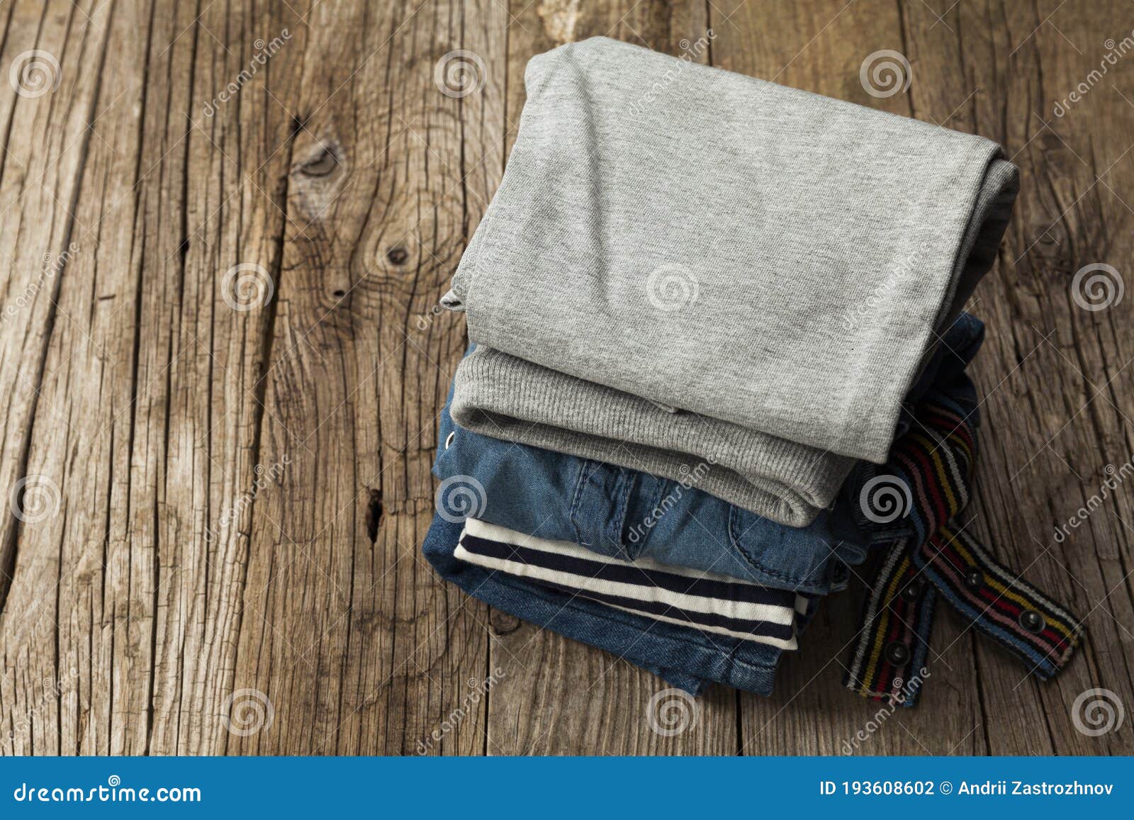 Stack of Old Clothes To Discard Declutter or Donate. Recycling Fabric ...