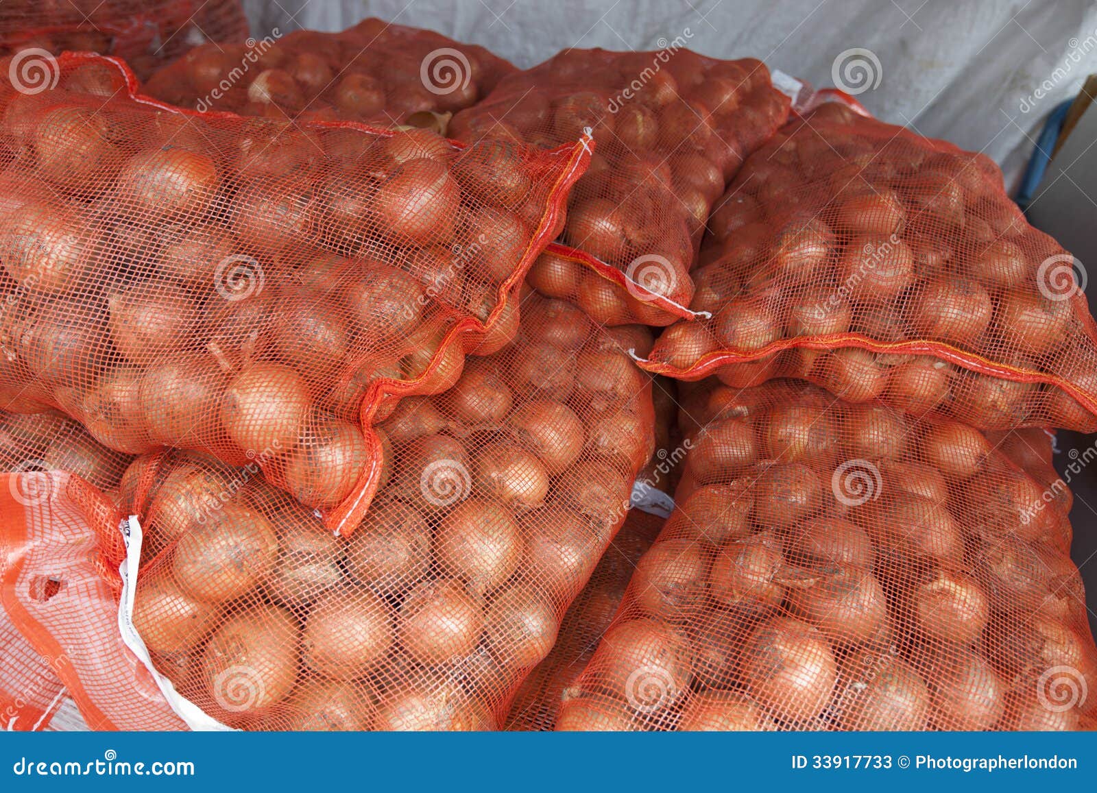 Stack of Onion Sacks in Grocery Store Stock Image Image of selling
