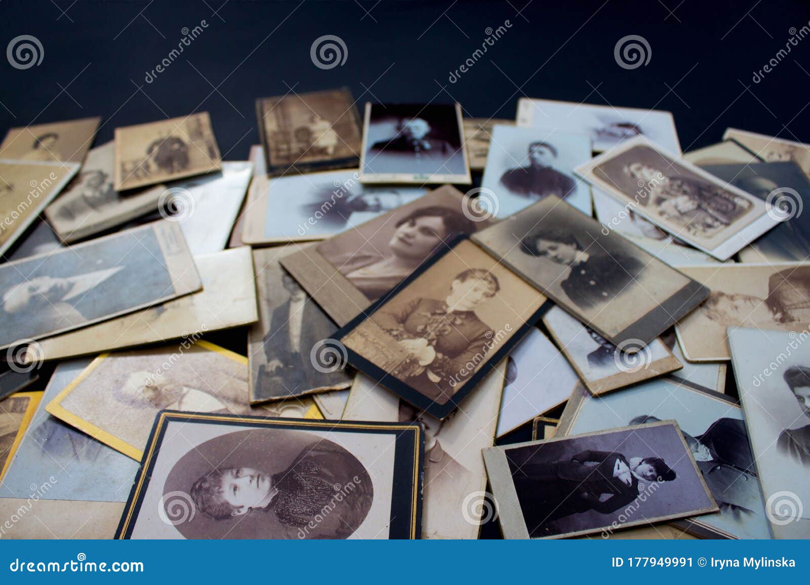 stack of original photos circa 1870-1920 with copy space for your logo or text. genealogy research