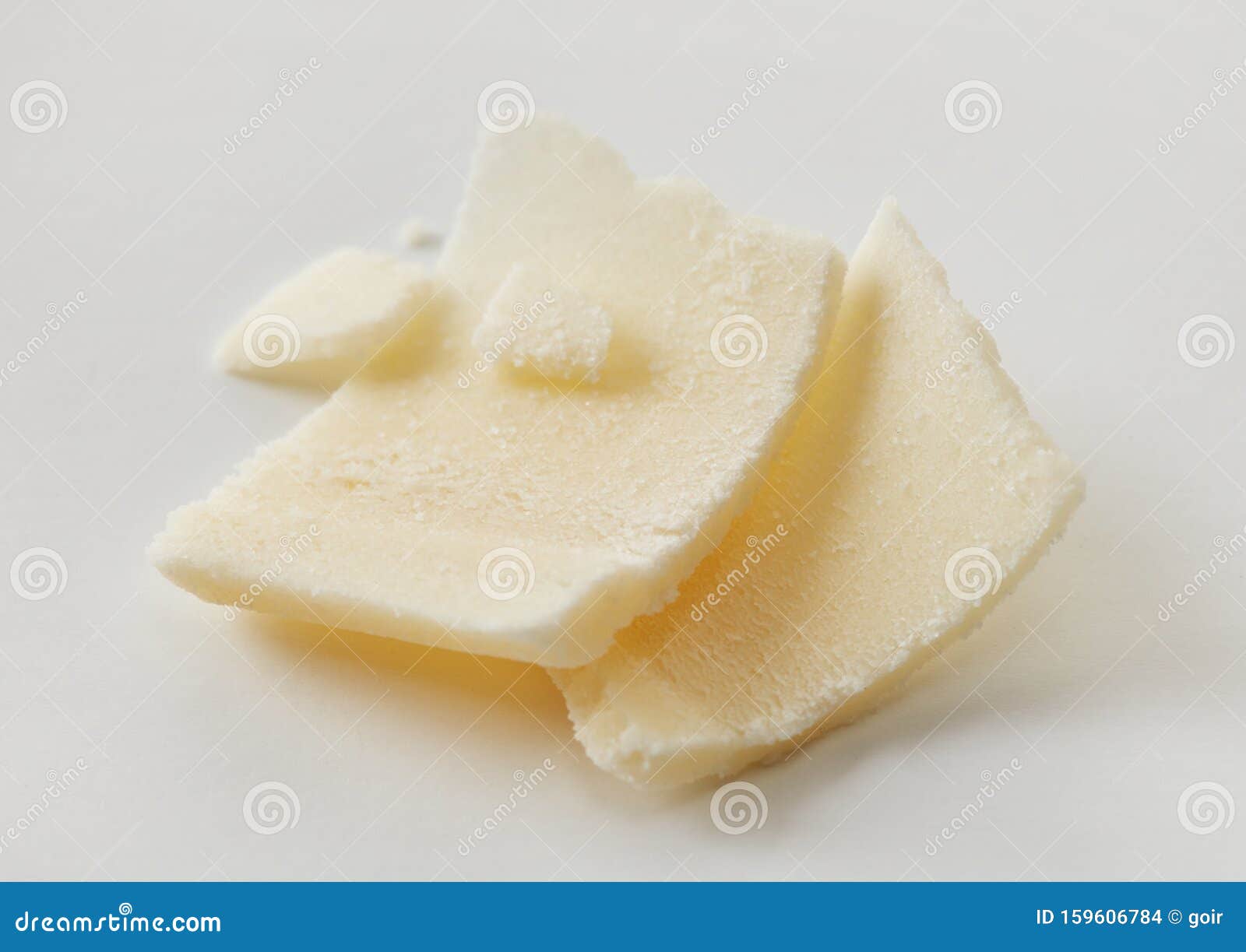 Parmesan flakes closeup stock photo. Image of dairy 159606784