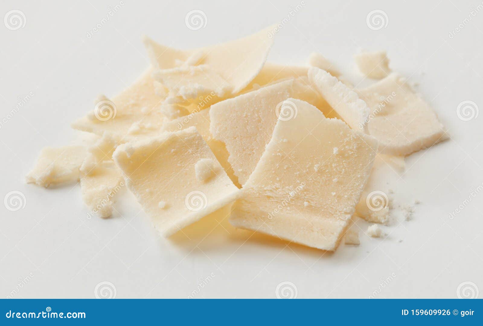 Parmesan flakes closeup stock photo. Image of shaved 159609926