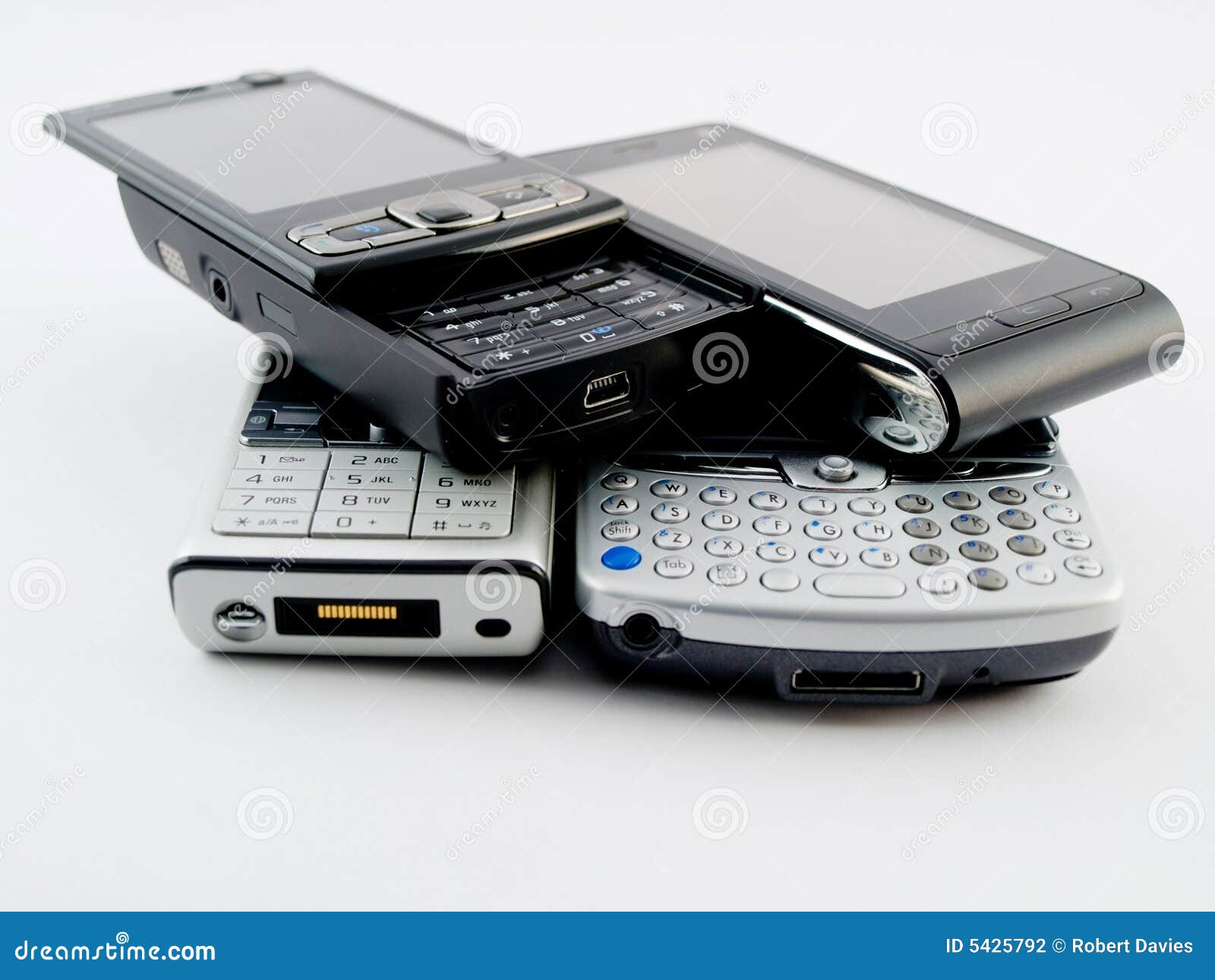 Stack Pile of Several Modern Mobile Phones PDA Stock Photo Image of