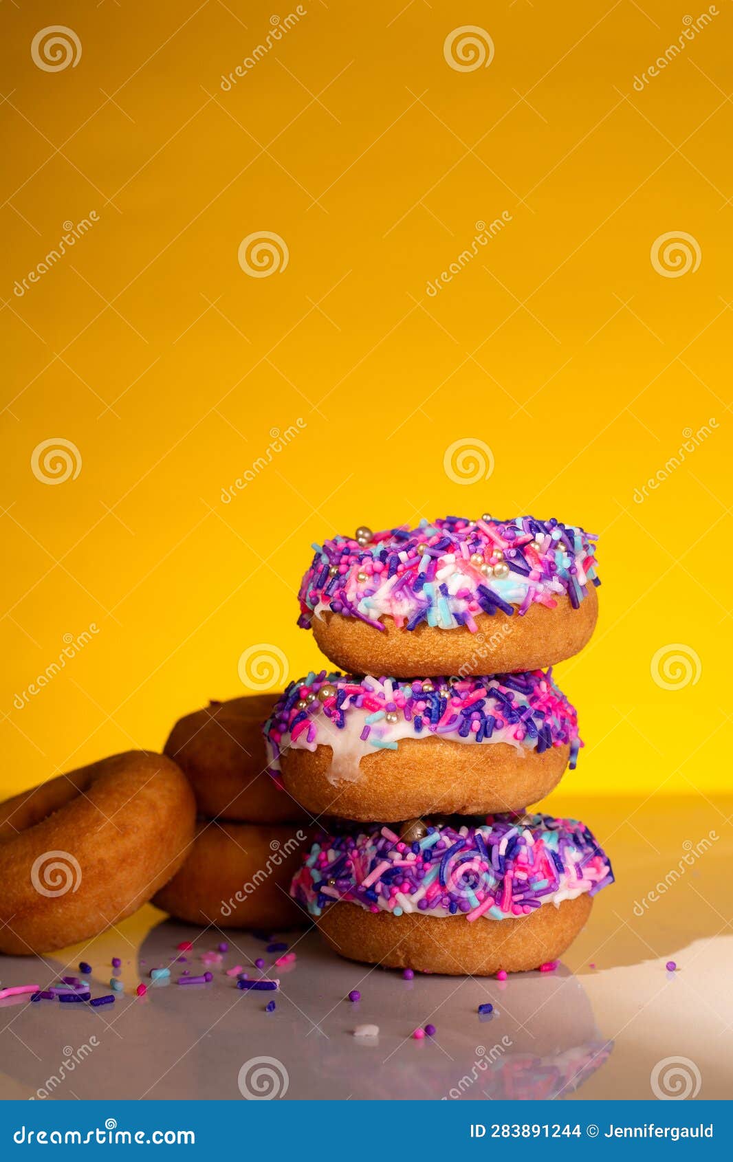 A Stack of Pink Sprinkle Donuts Stock Photo Image of stack, frosting