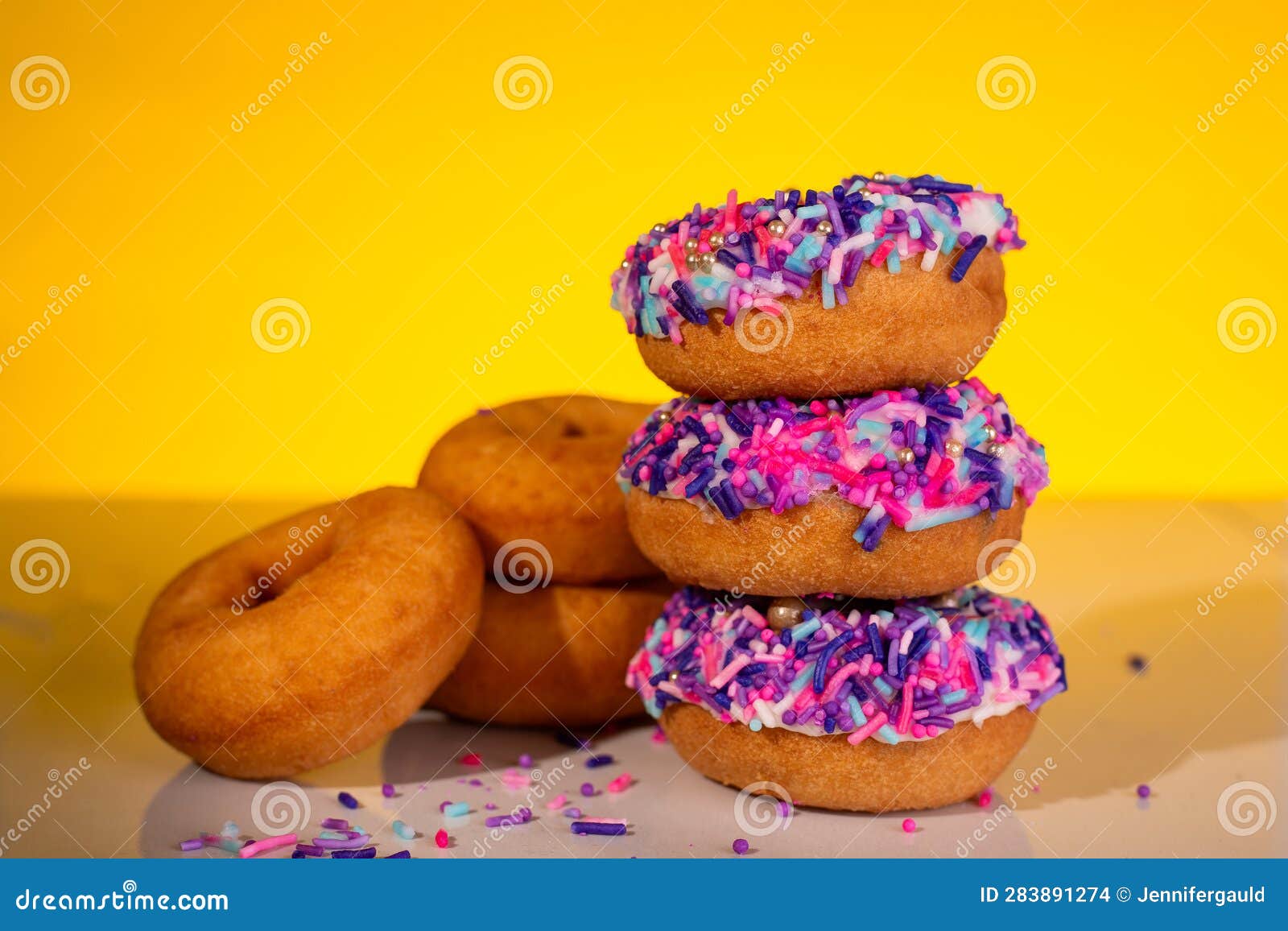A Stack of Pink Sprinkle Donuts Stock Photo Image of colourful
