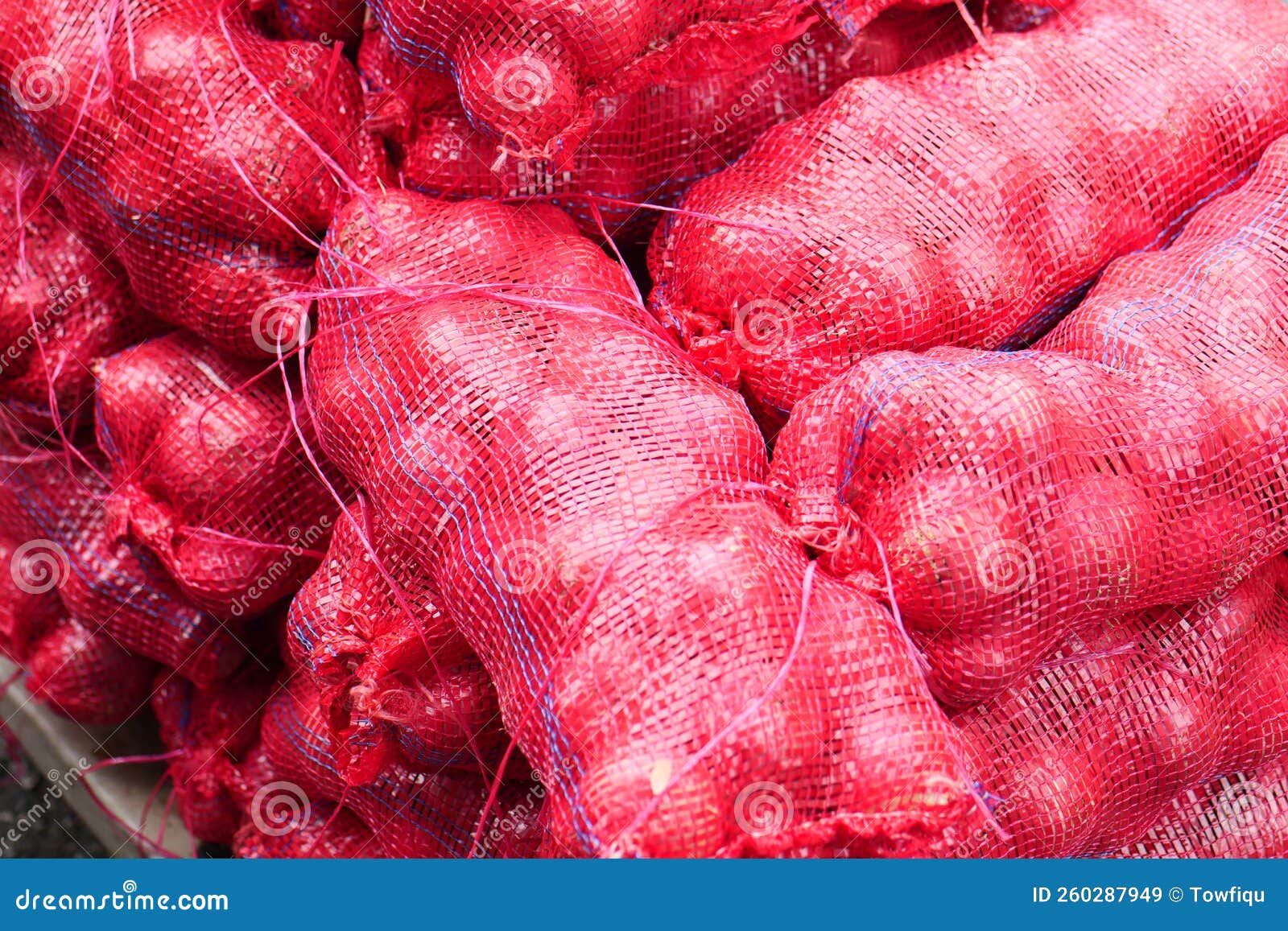 Stack of red onion in bags stock image. Image of healthy 260287949