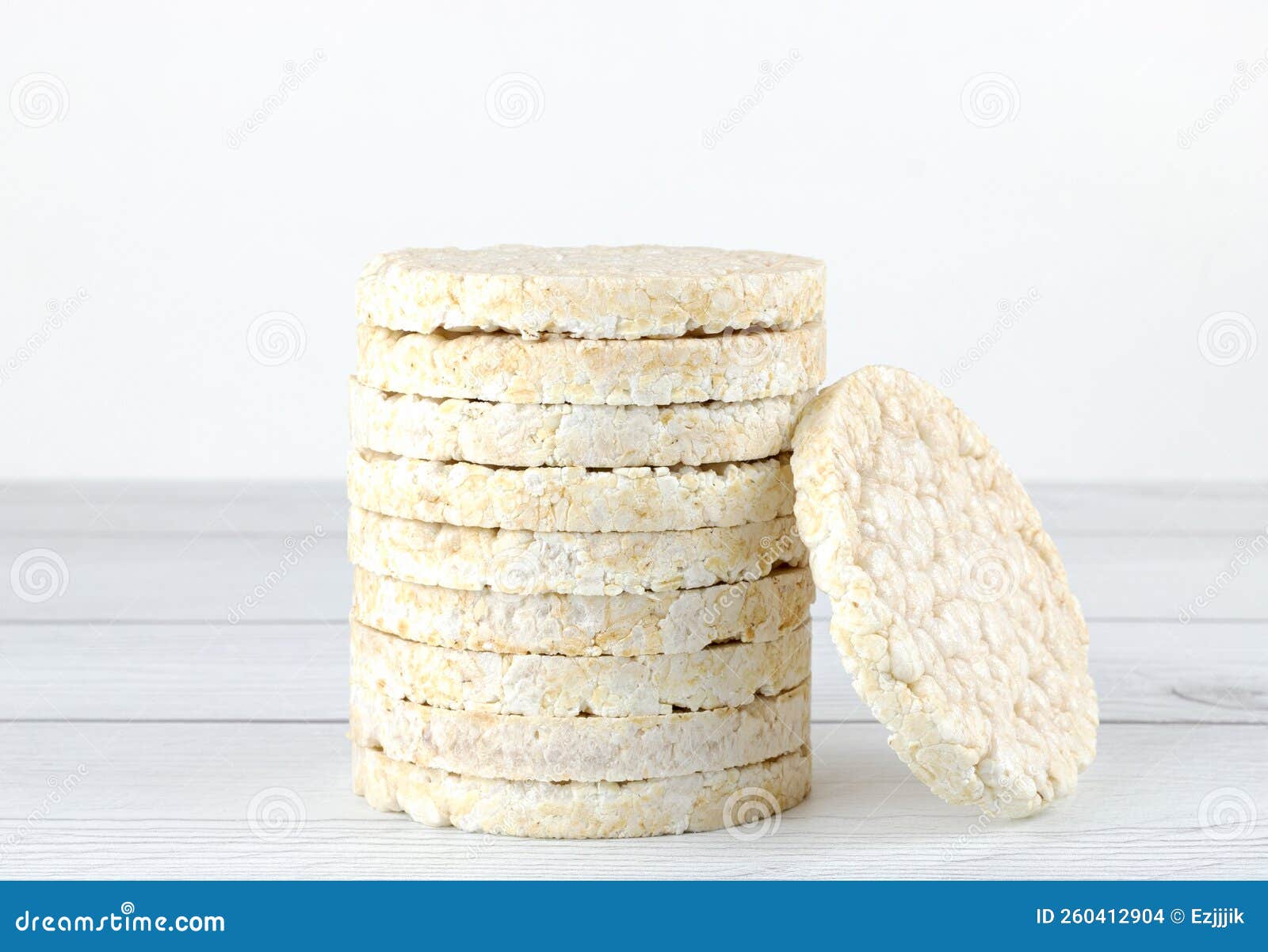 Stack of Rice Crackers on White Background, Copy Space. Alternative