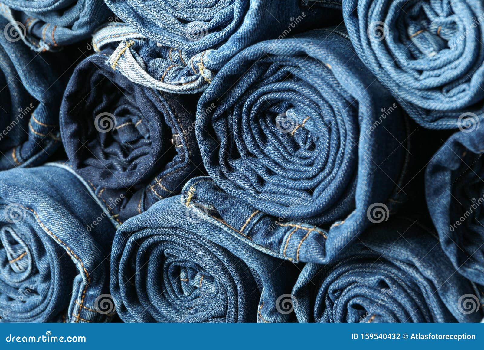 Stack Rolled Jeans Texture on Whole Background Stock Photo - Image of ...