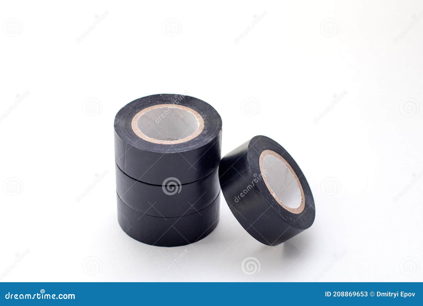 Stack of Rolls Black Vinyl Insulating Tape on the White Background