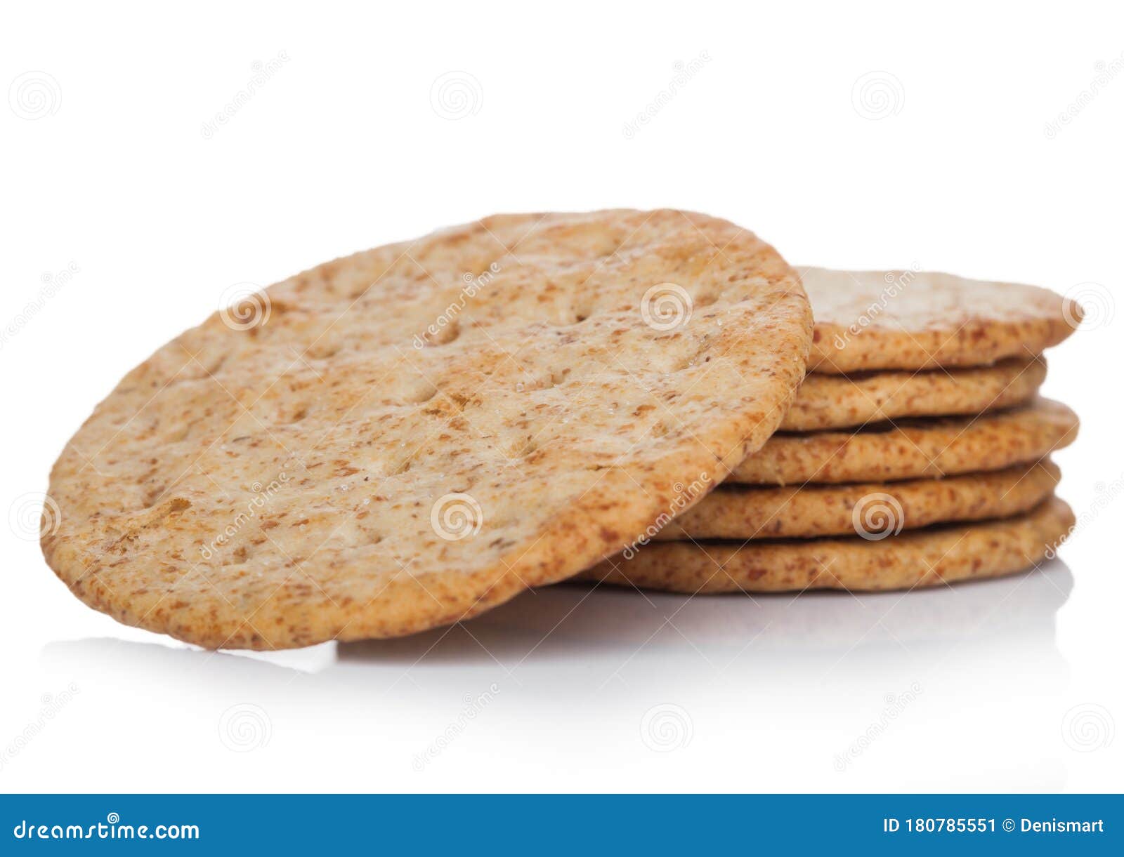 Stack of Round Organic Crispy Wheat Flatbread Salty Crackers on White