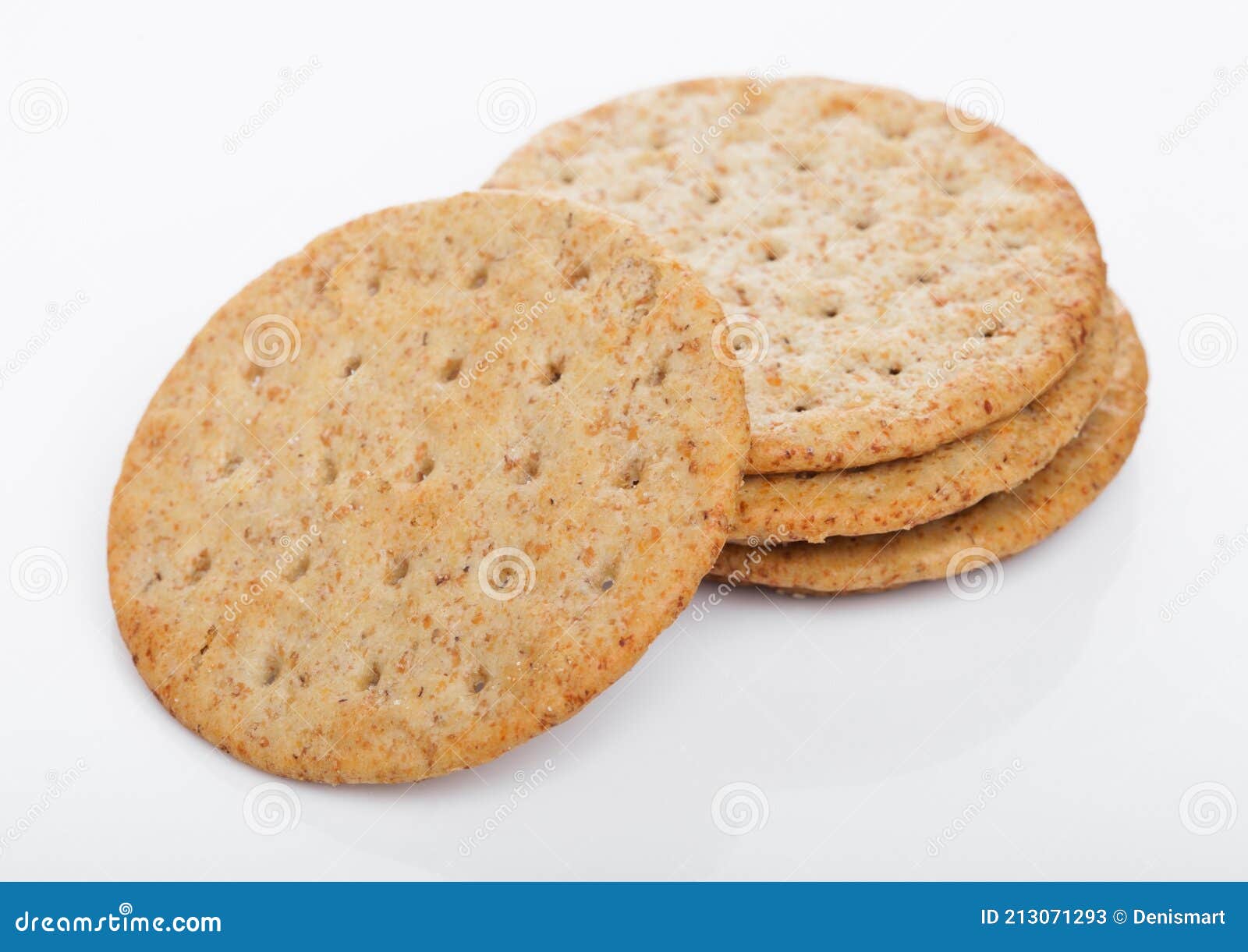 Stack of Round Organic Crispy Wheat Flatbread Salty Crackers on White