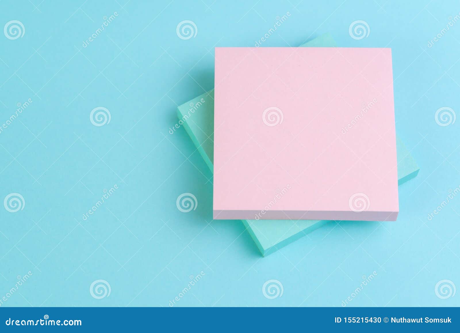 Stack of Sticky Notes on Blue Background with Pink on Top with Copy Space for Writing Message Using As Inspiration Text, Memo, Stock Photo - Image notepad, information: 155215430
